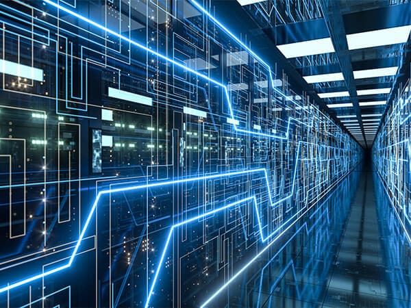 Wholesale Wavelenghts Feature Tiles 600x450 Data center with a grid of neon blue lights running along the walls